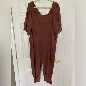 Free People “Lotta Love Romper” in color “brown butter.” Size medium.